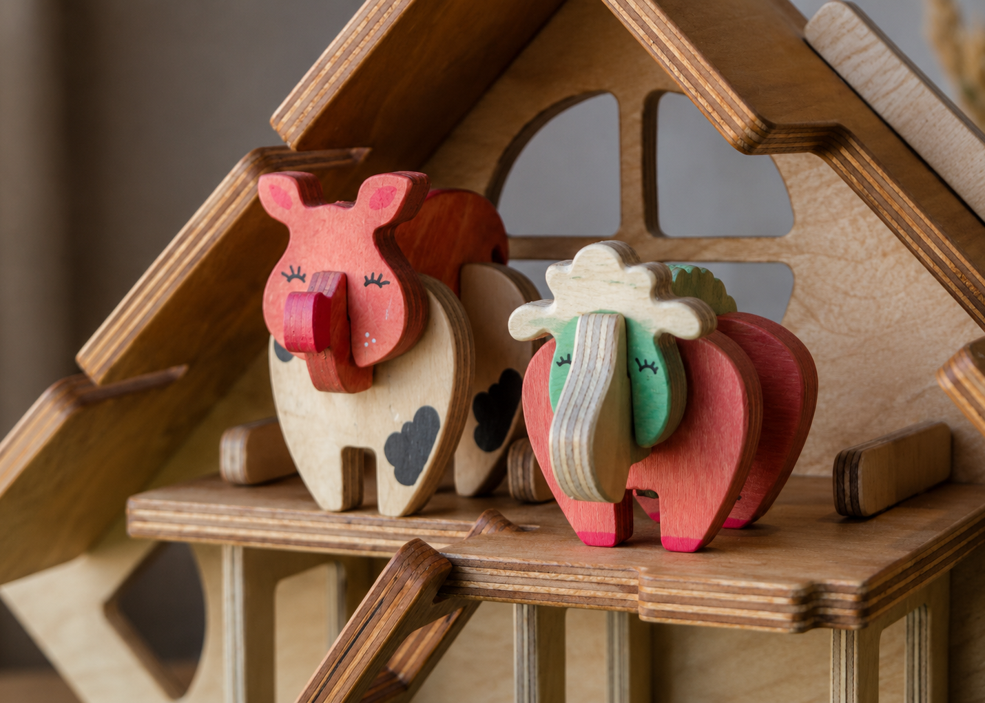 Creative wooden animals with interchangeable bodies in a barn, finished with non-toxic pigmented oil. 