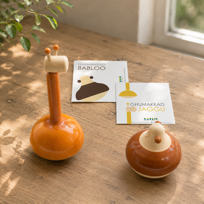 Two animal figurine rattles, handcrafted in channapatna, with introduction cards. 
